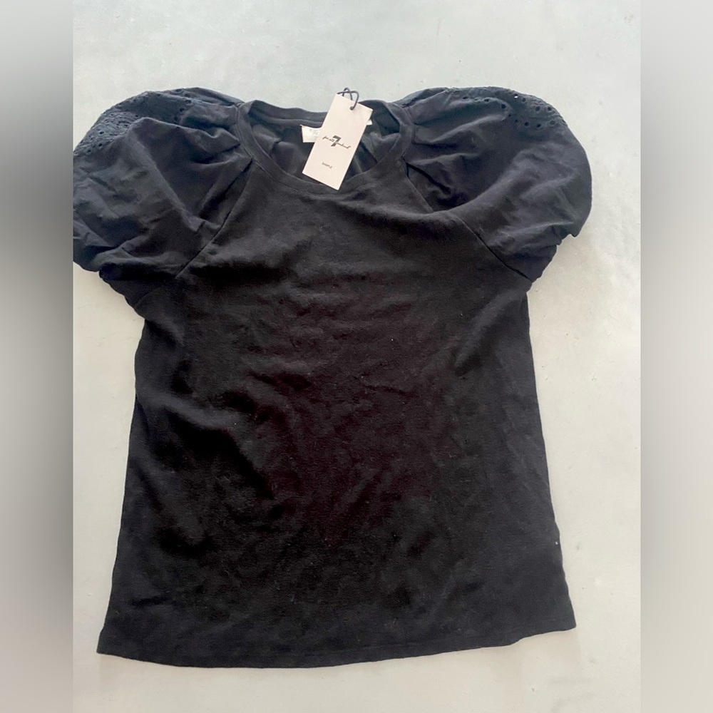Women’s shirt with pattern designs on the shoulder